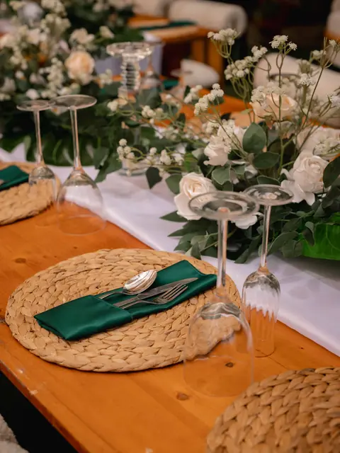 Elegant place setting with emerald napkin