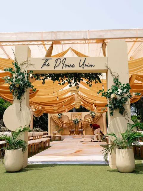 Grand entrance arch with gold drapery